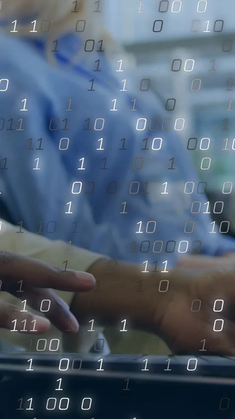 Vertical video: Man typing laptop keys in training, making binary overlay hiding Vídeos de archivo 330332567