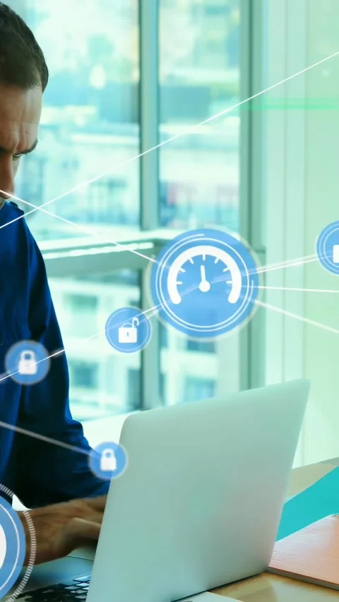 Vertical video: Man typing on laptop causing blue HUD icons, forming secure Video stock 331199252