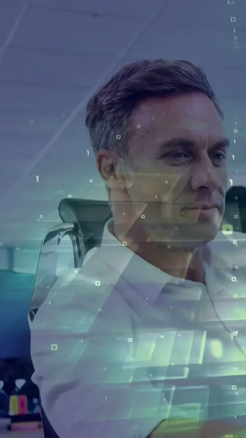 Vertical video: Man typing on laptop and sharing tech data, digital overlay Stock Footage 331338035