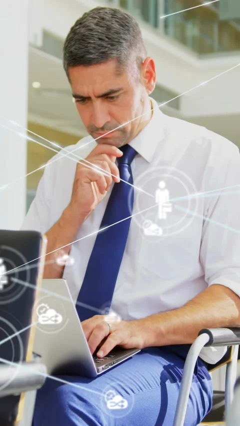 Vertical video: Man typing on laptop, starting business network overlay, pausing Stock Footage 332278551