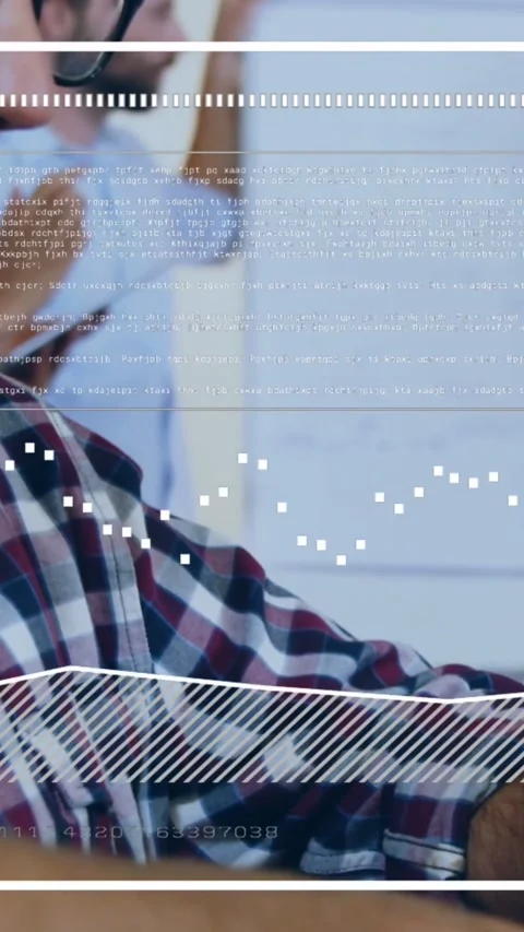 Vertical video: Man typing, starting analytics overlays tracing keys while view Stock Footage 331739414