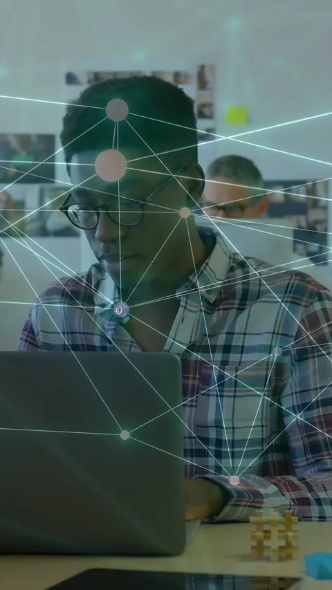 Vertical video: Man typing in tech space showing net data as nodes and lines Stock Footage 333542478