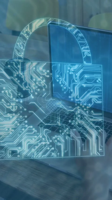 Vertical video: Man using laptop at table causing padlock circuit overlay on Stock Footage 335355437