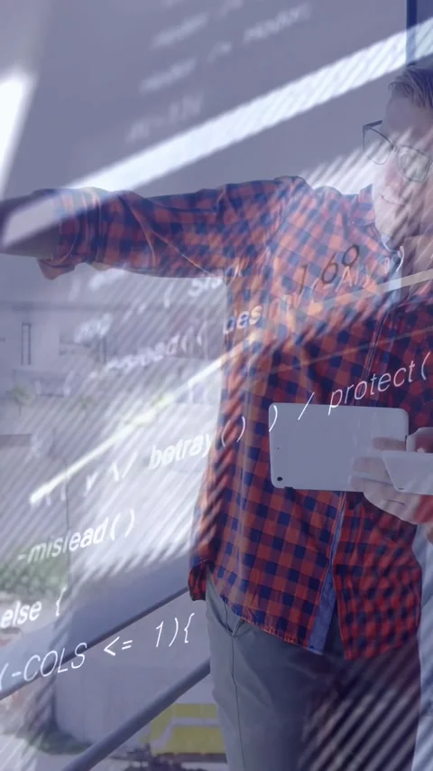 Vertical video: Man using tablet after balcony handoff, pointing while aligning Stock Footage 334540976