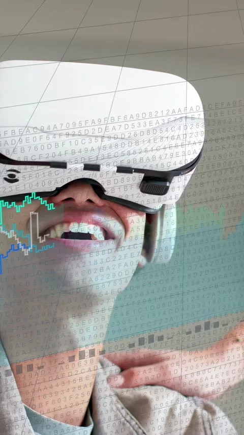 Vertical video: Man in VR headset laughing, waving hand, activating tech HUD Stock Footage 333861998