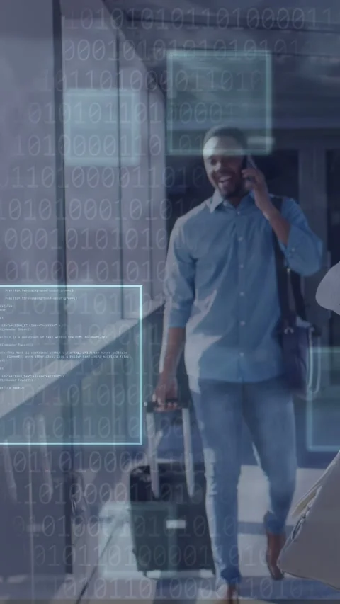 Vertical video: Man walking hall pulling suitcase, checking phone causing tech Stock Footage 333839996