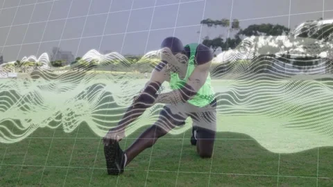 Vertical video: man warming and reaching toes leg stretch on grass grid or wave Stock Footage 334184795