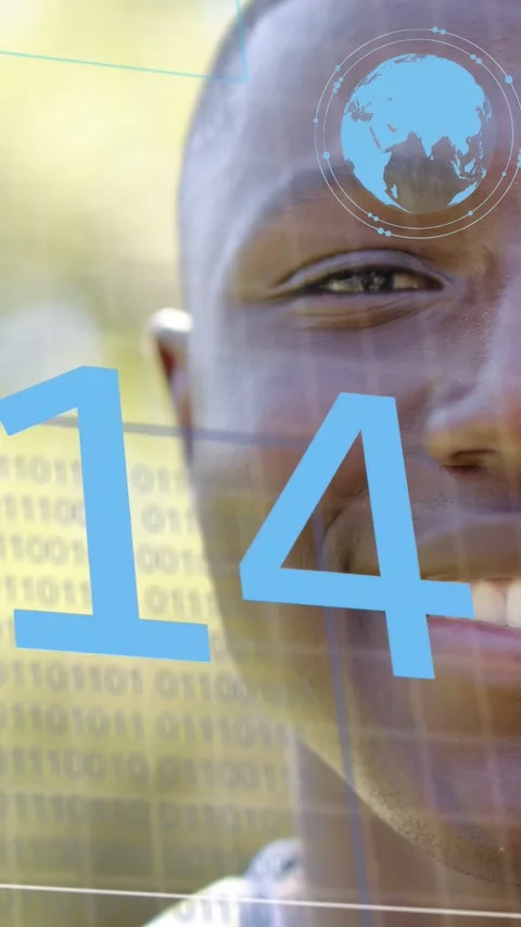 Vertical video: Man watching numbers cycling in tech, smiling at update as globe Stock Footage 333527940