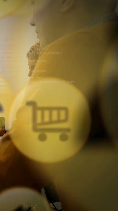 Vertical video: Man watching while hand tapping phone, cart icons and code Stock Footage 332985370