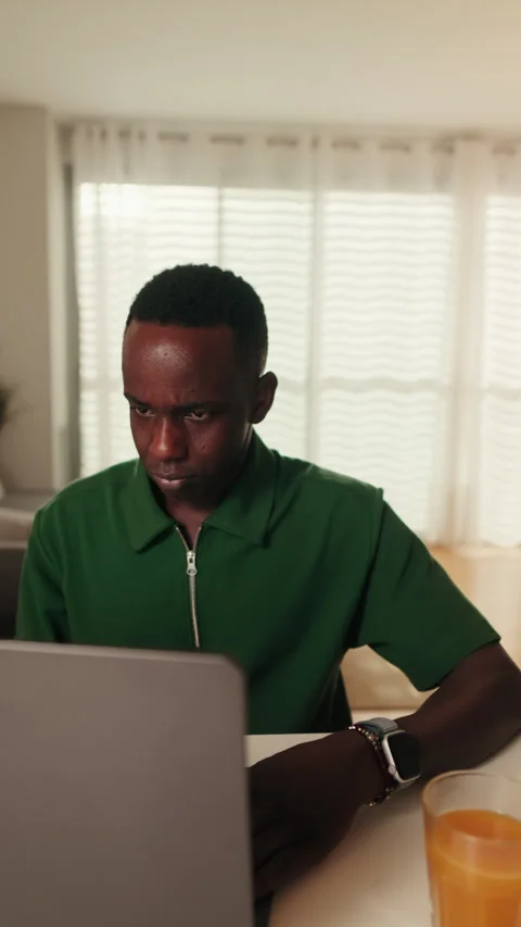 Vertical video, Man Working From Home on Laptop Stock Footage 313552048