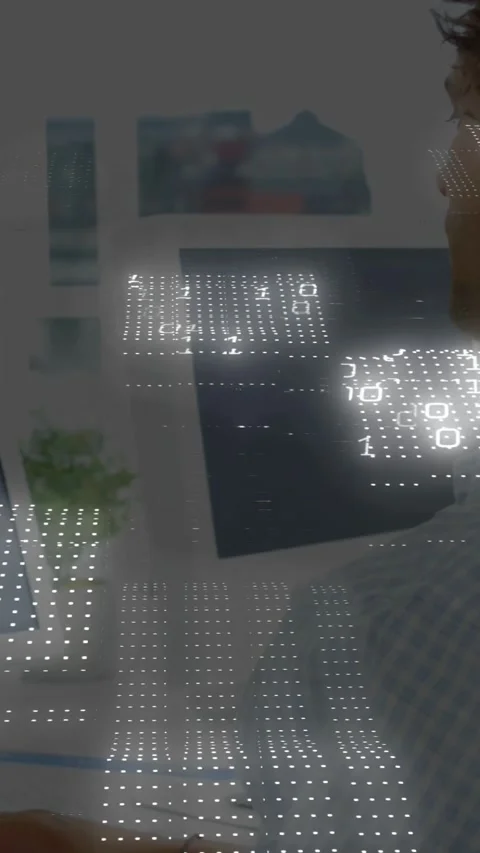 Vertical video: Man working tech moving mouse and typing causing binary Stock Footage 333496289