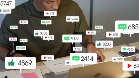 Vertical video: Man writing flipping charts and using laptop as badges rising, Stock Footage 334182477