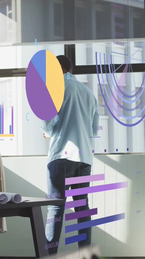 Vertical video: Manager checking data at window while animated charts overlaying Stock Footage 333895856