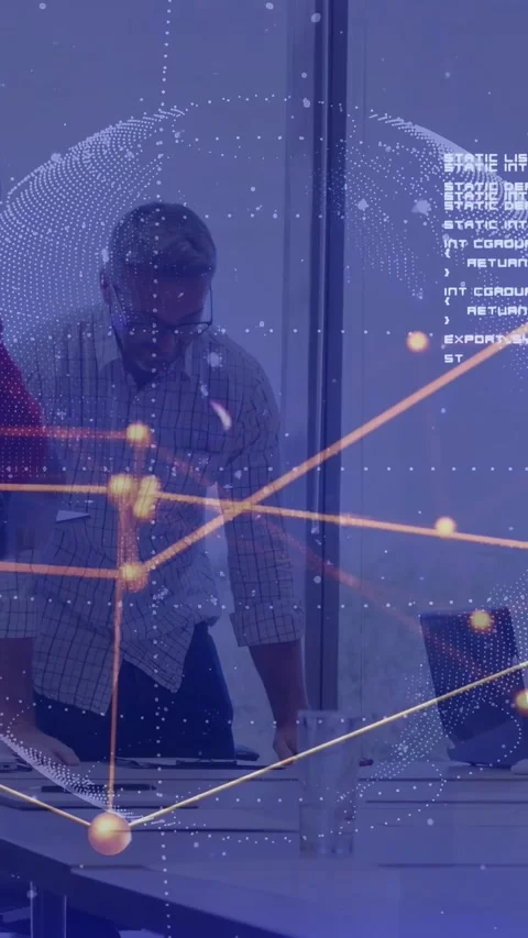 Vertical video: Manager tapping laptop, initiating faint globe and code overlay Vidéo 337538933