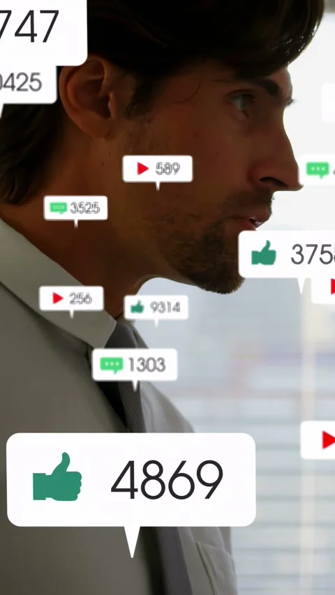 Vertical video: Manager tapping phone, likes or comments popping around head, Stock Footage 333079715