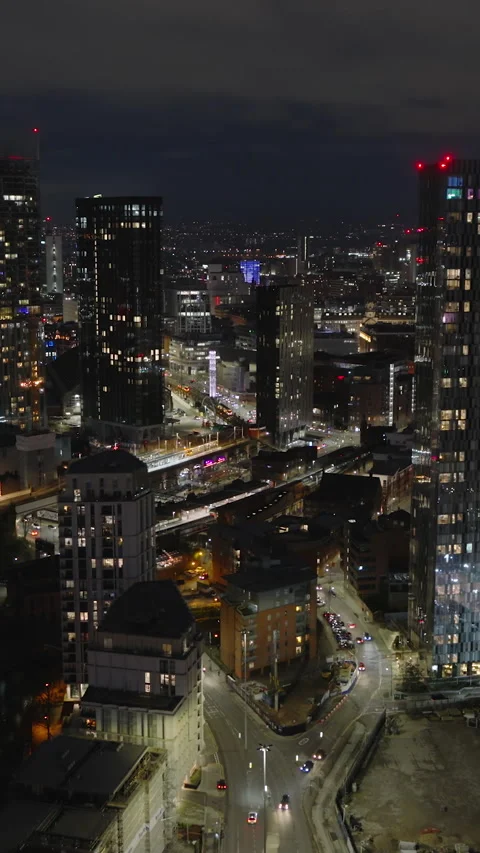 Vertical Video of Manchester, Vertical Aerial View Shot, night, evening Stock Footage 266451663