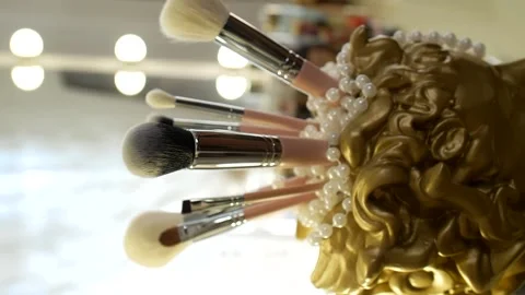 Vertical video. many makeup brushes on the table in the beauty salon Stock Footage 155989021