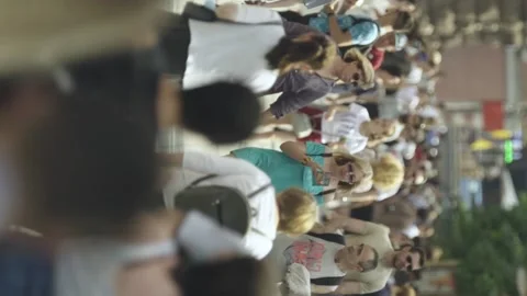 Vertical video of many people walking in... | Stock Video | Pond5