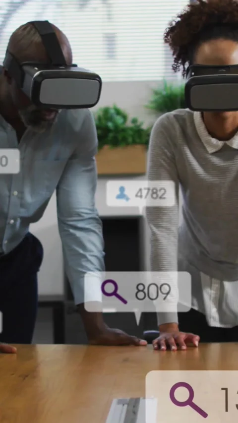 Vertical video: Marketing team using VR touching table and interacting with HUD Stock Footage 334391072