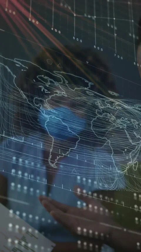 Vertical video: Masked team flipping tablet in ops hub, transparent map UI Stock Footage 331128603