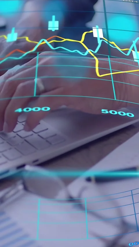 Vertical video: Mature man typing on laptop, activating animated finance charts Stock Footage 335355359