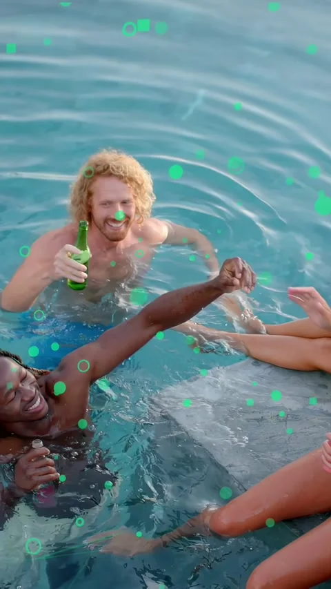 Vertical video: Men high-five causing splash at ledge, group drinking, green Stock Footage 333912840
