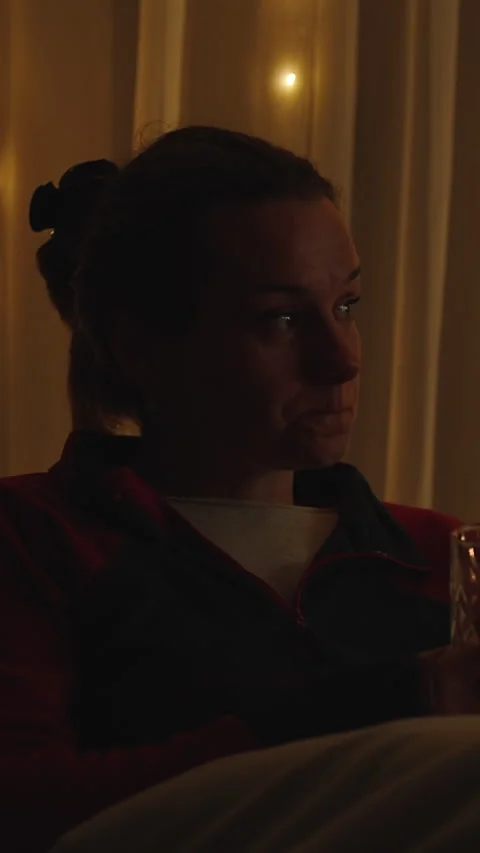 Vertical video. Men's Hands Sorting Pecan Nuts in Shells, Macro Dolly on a Black Stock Footage 263992280