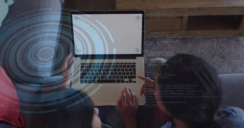 Vertical video: Mentor pointing guiding learner showing radar and code Stock Footage 330980556