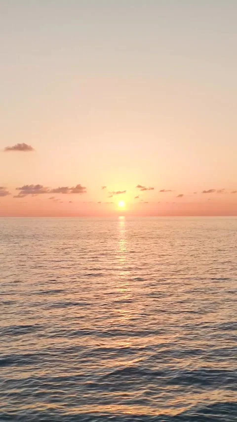 Vertical Video: A mesmerizing coastal view with luxurious water textures and Stock Footage 297659649