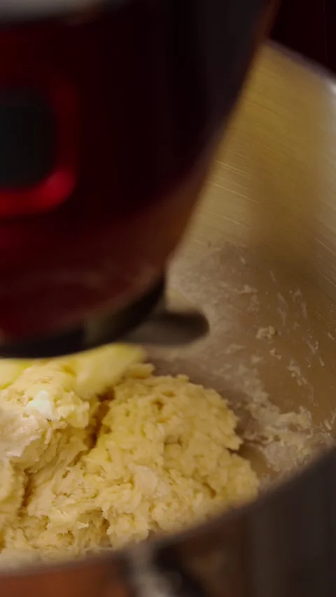 Vertical video, Mix and knead yeast dough and soft butter with a hook Stock Footage 282499699