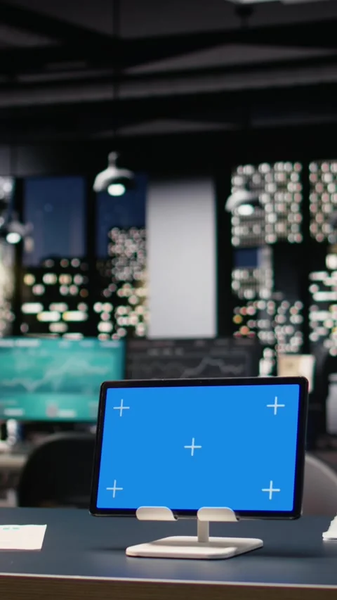 Vertical Video Mockup blue screen tablet with empty office space and glass Stock Footage 334103555