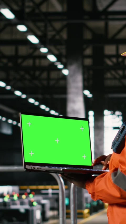 Vertical Video Mockup on laptop, black female engineer, ensuring production line Stock Footage 330085262