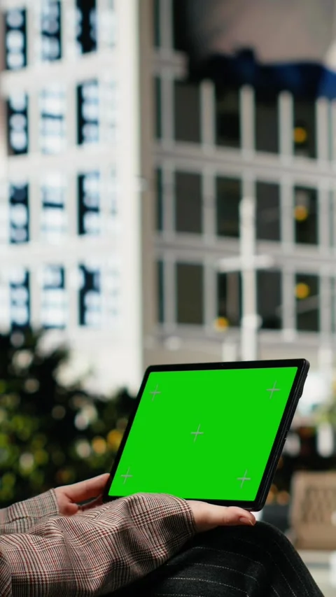 Vertical video Mockup tablet used by female professional to finish work tasks in Stock Footage 343560757