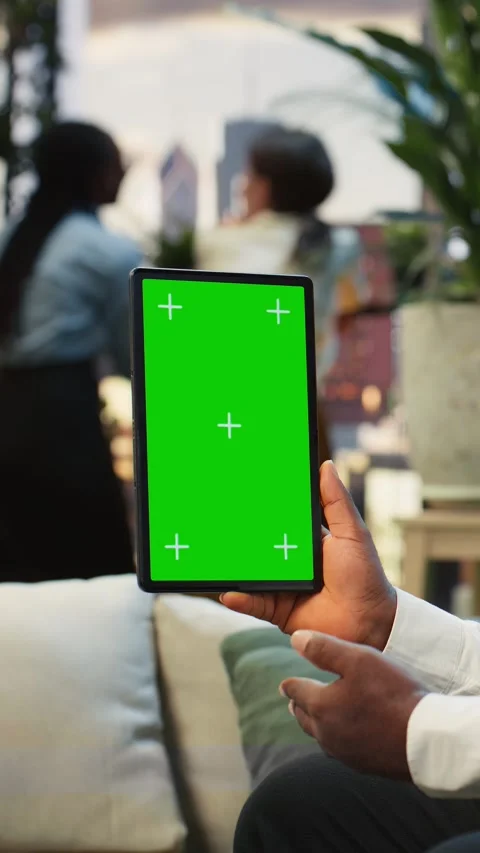 Vertical video Mockup tablet used by businessman next to plants on rooftop Stock Footage 345166859