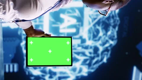 Vertical video Mockup tablet user updating AI systems Stock Footage 249843892