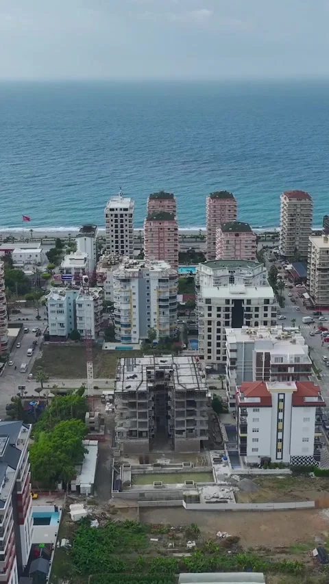 Vertical Video: A modern construction site with workers and engineers preparing Stock-Footage 297639431