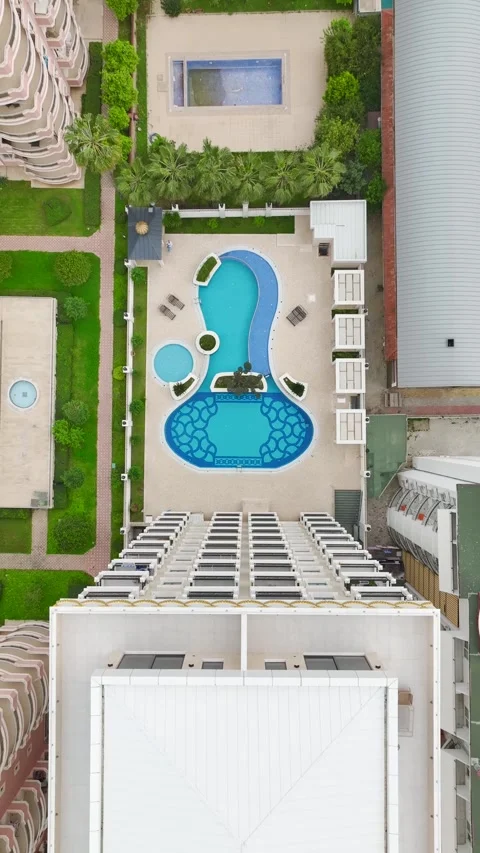 Vertical Video of Modern Seaside Villas With Infinity Pools Stock Footage 342366672