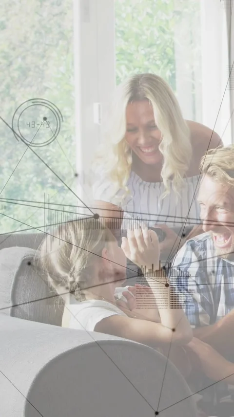 Vertical video: Mom tapping phone, dad showing girl, high-fiving, cheering while Stock Footage 333577317