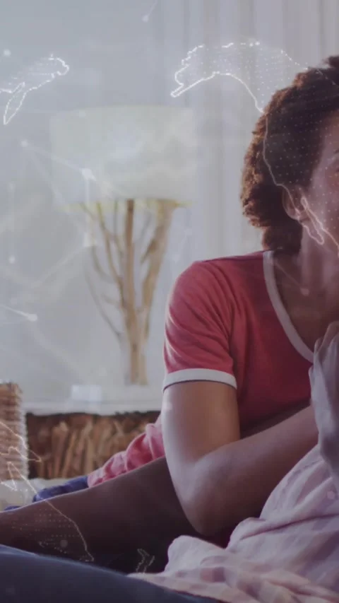 Vertical video: Mom touching kid, starting globe for tech, moving across frame, Stock Footage 331580741