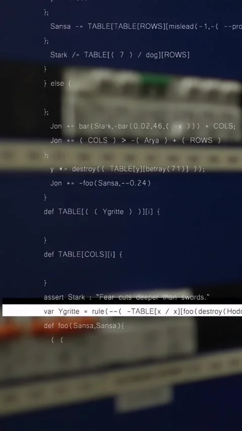 Vertical video: Monitor autoscrolling code, white bar moving, revealing orange Stock-Footage 334602836