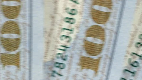 Vertical video. Motion of many hundred dollar bills in macro on background. Stock Footage 265080033
