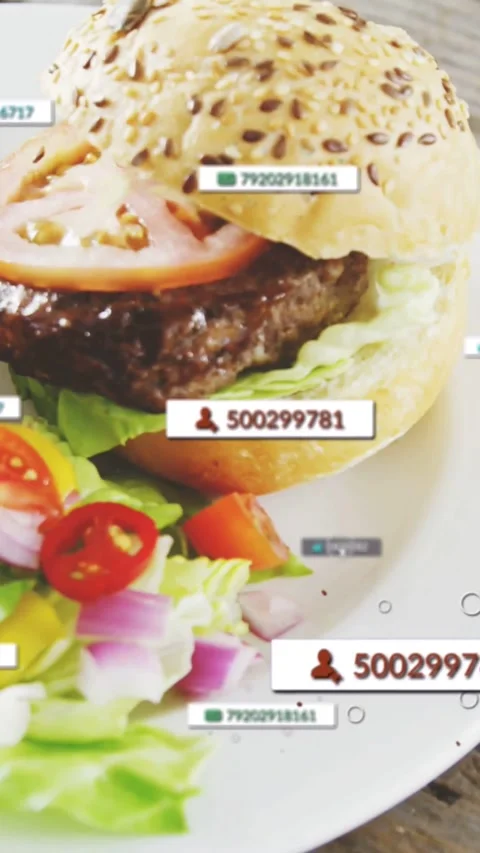 Vertical video: Mouse entering causing ID tags moving over burger while focus Stock Footage 334598907