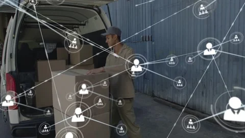 Vertical video: Mover pulling boxes from van for delivery, stacking while Stock Footage 331063031
