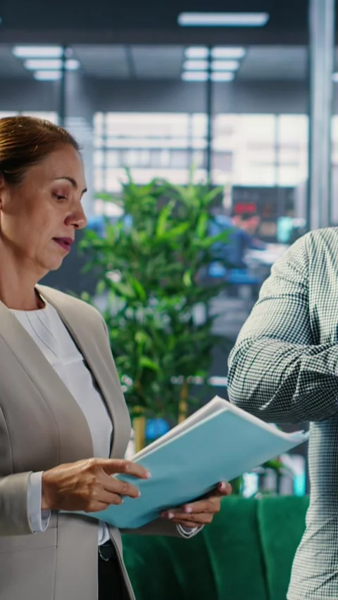 Vertical Video Multicultural corporate professionals with goal oriented mindset Stock Footage 309486607
