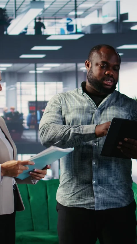 Vertical Video Multicultural corporate professionals with goal oriented mindset Stock Footage 309834072