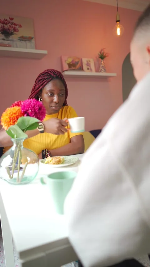 Vertical video of Multiracial couple having breakfast at home Stock Footage 219652648