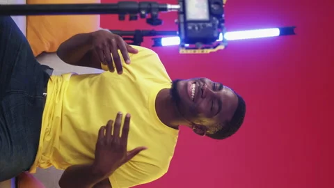 Vertical video music vlog man singing song camera Stock Footage 231150384