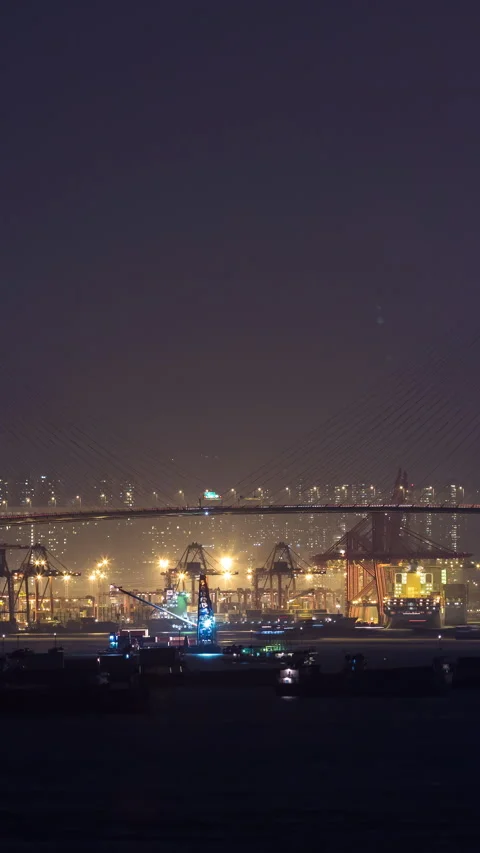 Vertical video - Night Timelapse of Busy Ports in Hong Kong Stock Footage 280048536