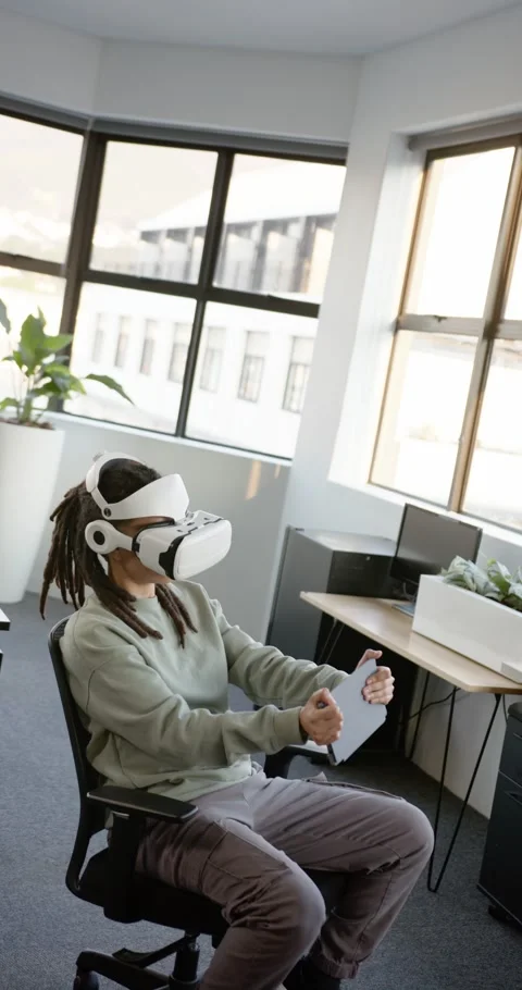 Vertical video: Non-binary person testing VR sim with headset activating, Stock Footage 344706106