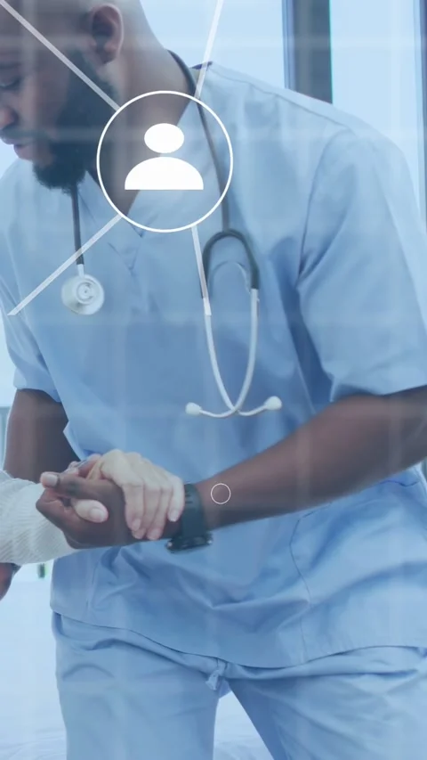 Vertical video: Nurse placing hand aiding patient to stand while network Stock Footage 337540841